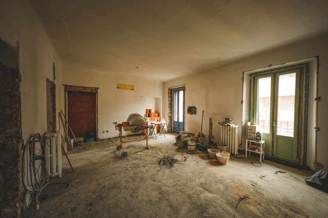 Villa room mid-renovation with building work under way